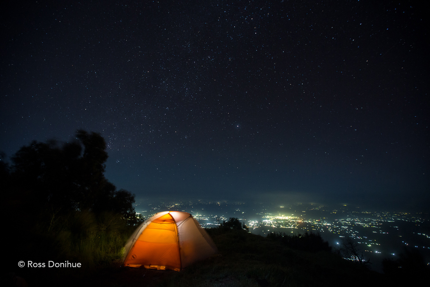 Campsite on Santa Maria with a view below of the cities located close to the flanks of the active Santiaguito dome.